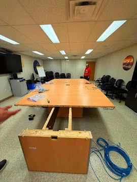 Conference table disassembly and relocation - Horizon Moving Fort McMurray